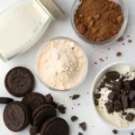 Ingredients for cookies and cream protein shake on a counter