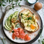 Serving of baked cottage cheese eggs with healthy sides