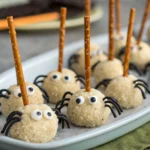 Creepy Cheese Balls with Pretzel Legs