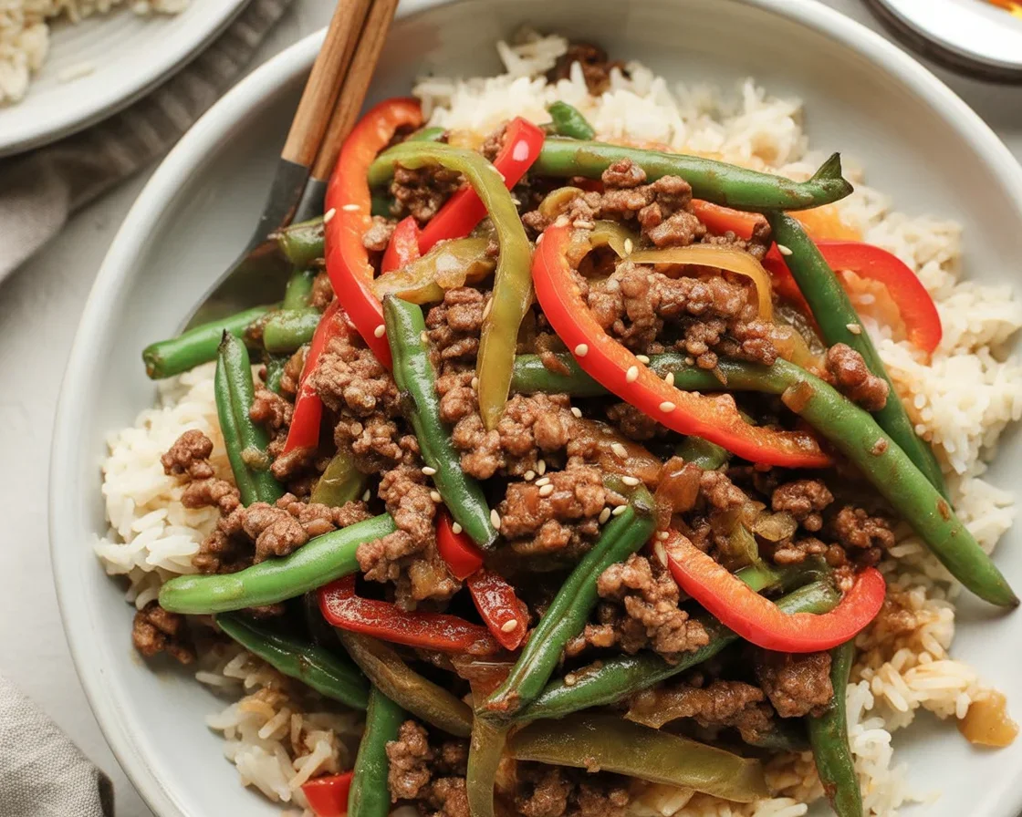 High protein stir fry with chicken and colorful veggies, ready in 30 minutes.