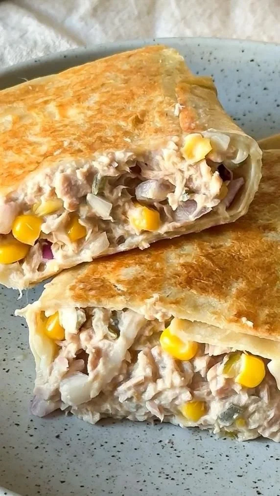 Tuna Melt Wrap with cheese and fresh ingredients on a plate