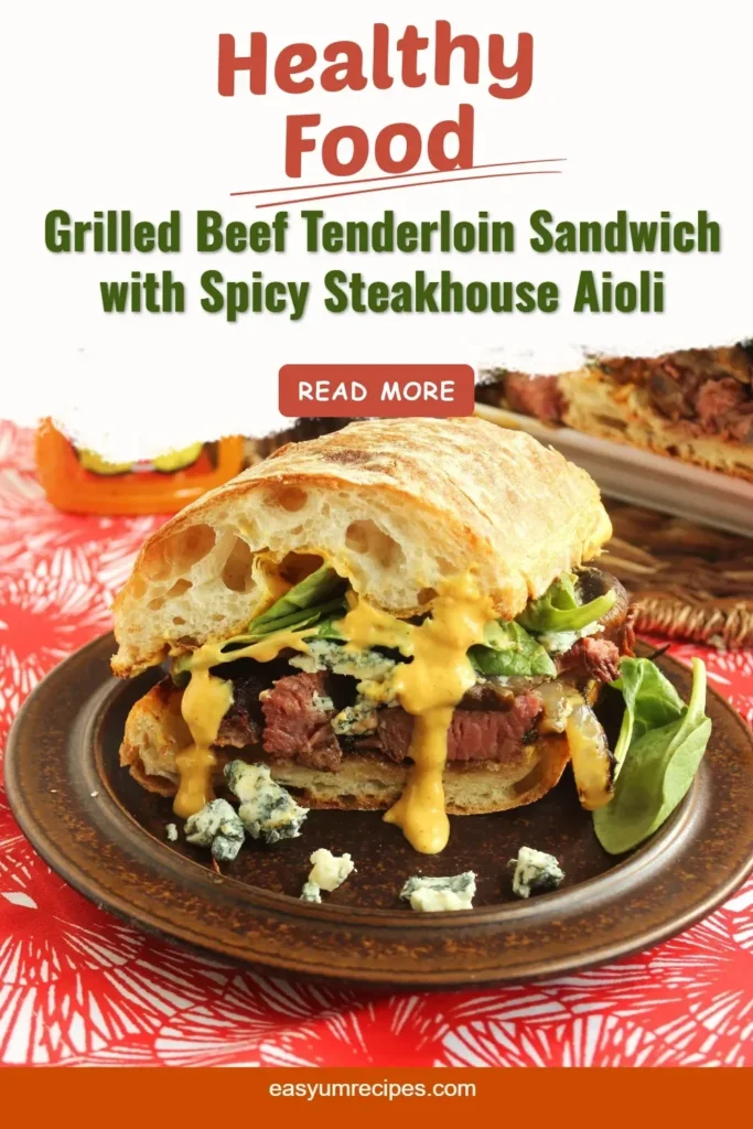 Grilled beef tenderloin sandwich with spicy steakhouse aioli served on a rustic roll.