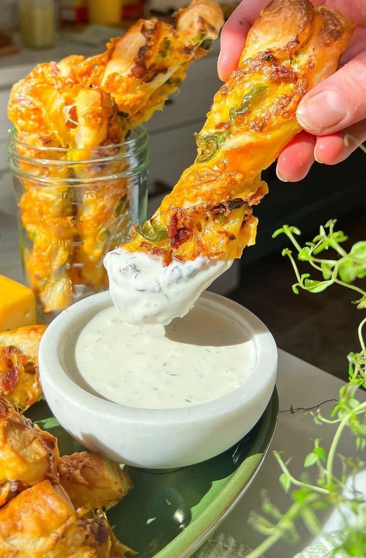 Super Bowl Jalapeño Popper Puff Pastry Twists on a serving platter