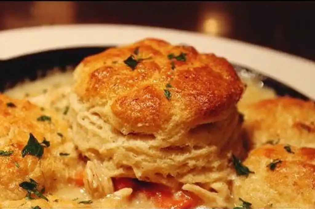 Red Lobster Biscuit Chicken Pot Pie served in a bowl with a biscuit on top.