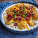 Creamy slow cooker loaded baked potato soup served in a bowl