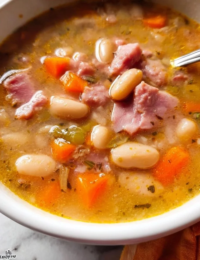 Bowl of easy homemade ham and bean soup with vegetables