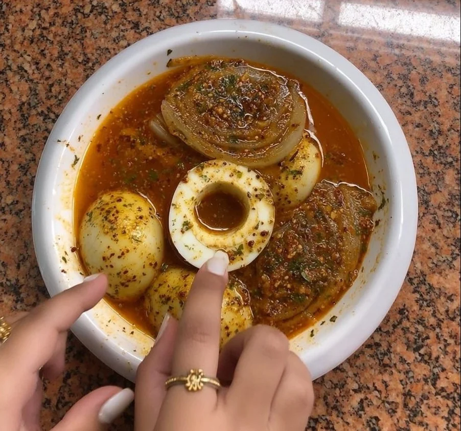 Egg and onion boil dish ready to serve with vibrant colors and rich flavors.