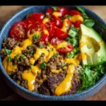 High-protein cheeseburger bowls with ground beef and burger sauce.