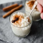 Delicious Mexican rice pudding served in a bowl with cinnamon topping