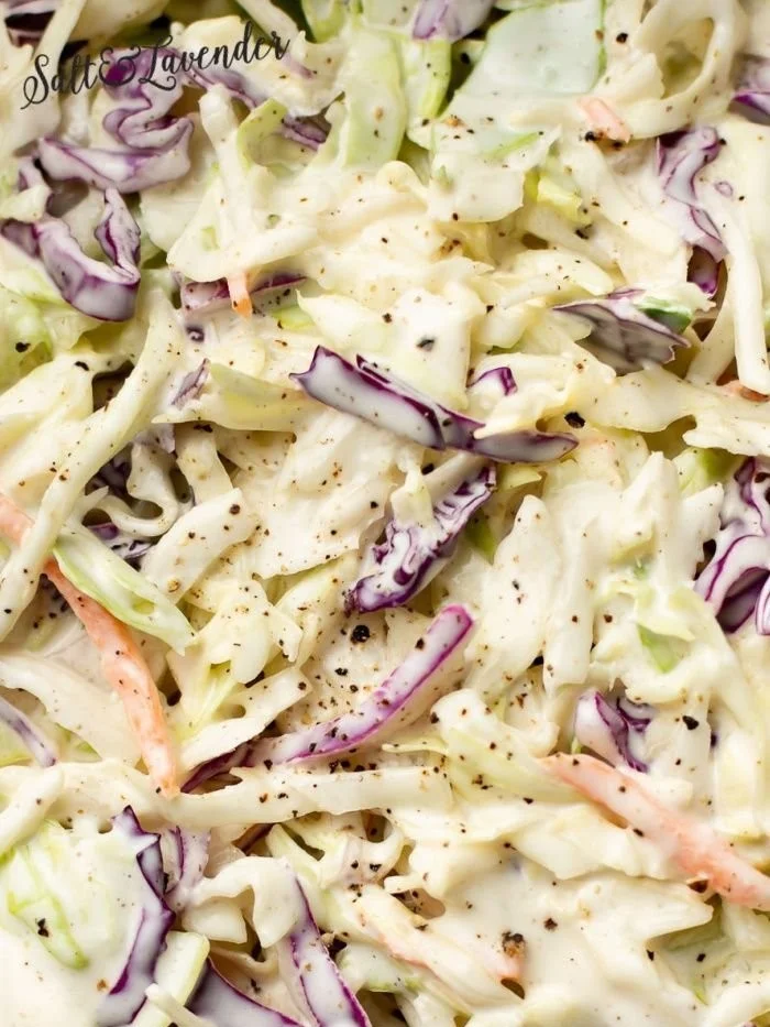 Bowl of perfectly balanced coleslaw with fresh vegetables and creamy dressing