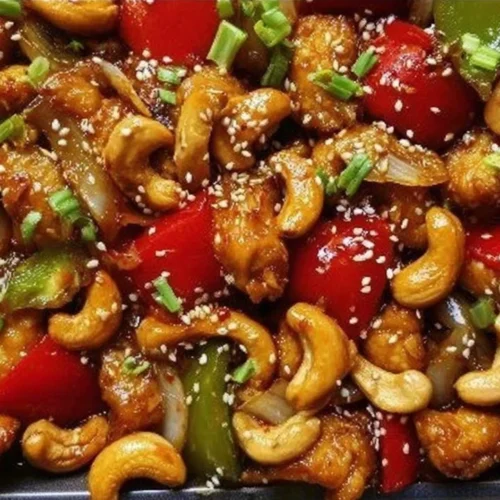 Delicious Sheet Pan Cashew Chicken served with vegetables and cashews