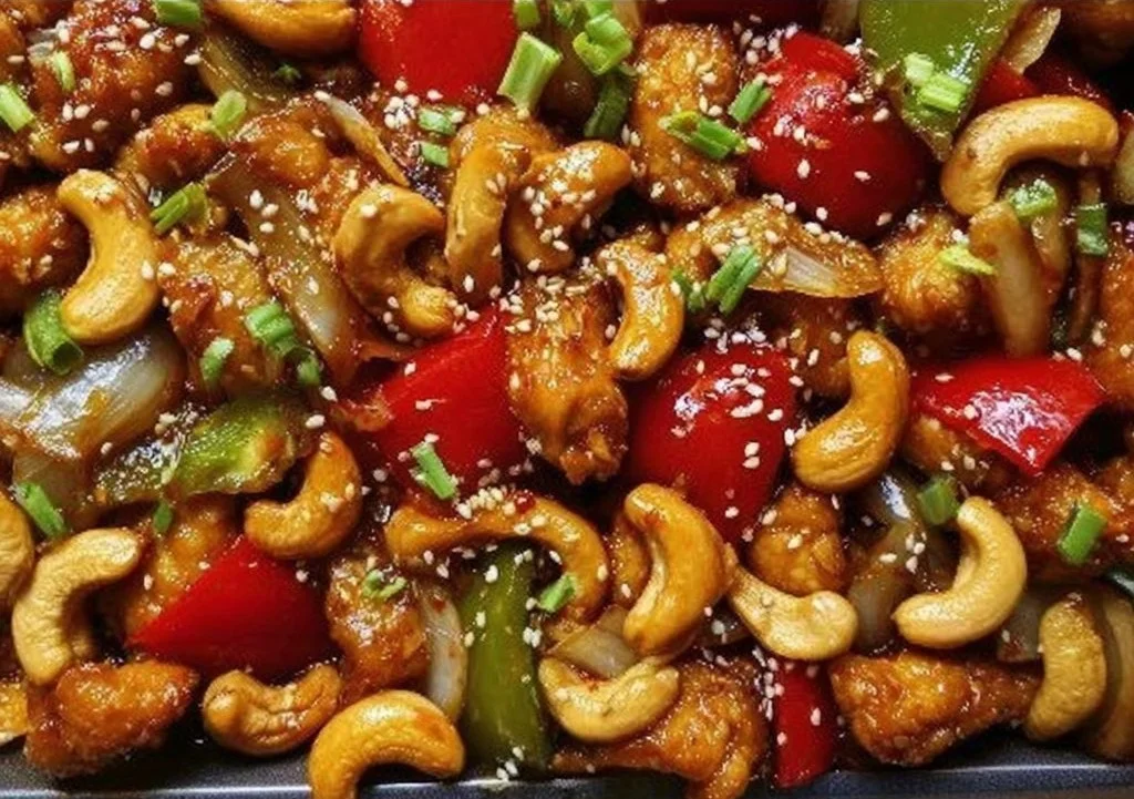 Delicious Sheet Pan Cashew Chicken served with vegetables and cashews