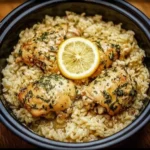 Slow Cooker Lemon Herb Chicken served with rice and fresh herbs