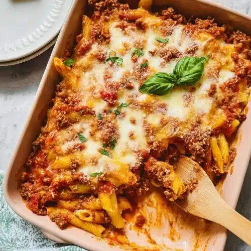 Delicious baked ziti with ground beef topped with melted cheese