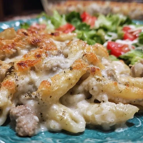 Creamy Sausage Alfredo Casserole with pasta and sausage