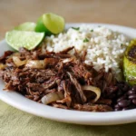 Cuban crispy shredded beef served with fresh vegetables and spices