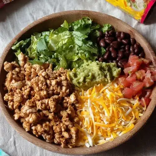 High protein turkey taco bowl with fresh vegetables and spices