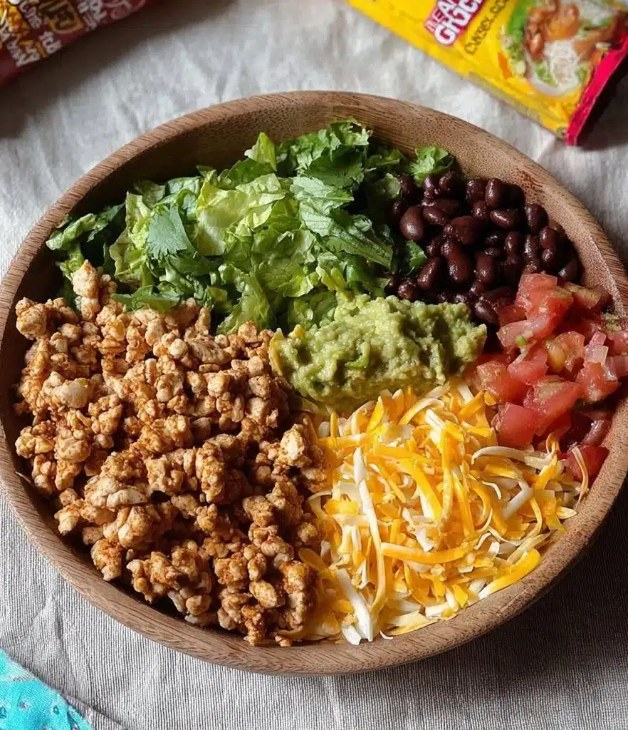 High protein turkey taco bowl with fresh vegetables and spices