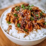 Slow Cooker Teriyaki Chicken served with rice and broccoli